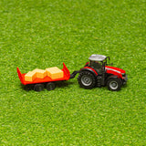 10CM MASSEY FERGUSSON 8740S TRACTOR WITH BALE TRAILER